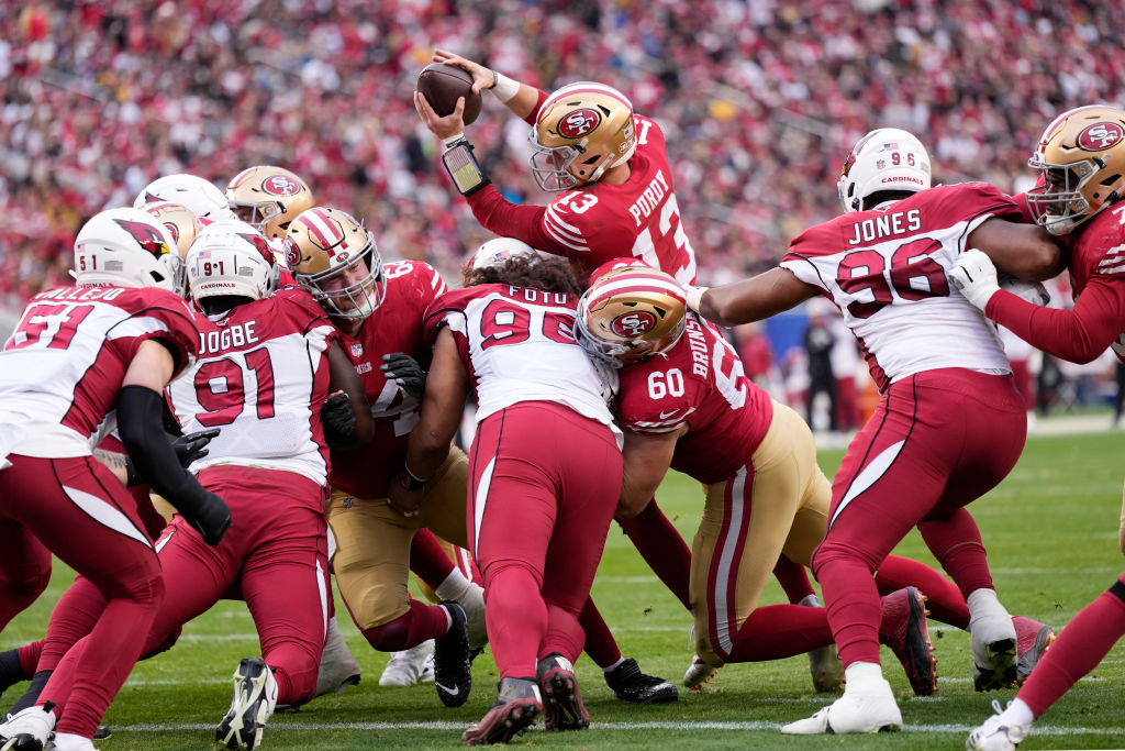 SANTA CLARA, CALIFORNIA - JANUARY 08: Brock Purdy #13 of the San Francisco 49ers looks to pass the ball during the fourth quarter of the game against the Arizona Cardinals at Levi's Stadium on January 08, 2023 in Santa Clara, California. (Photo by Thearon W. Henderson/Getty Images)